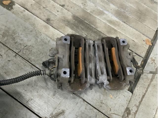 Супорт гальмівний задній правий 7P0615424 VAG