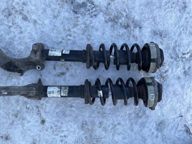 Стойка амортизатора передняя 80A413031AE VAG