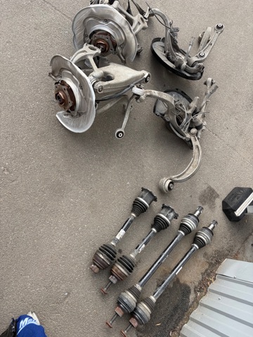 Піввісь передня ліва 95B407271E PORSCHE