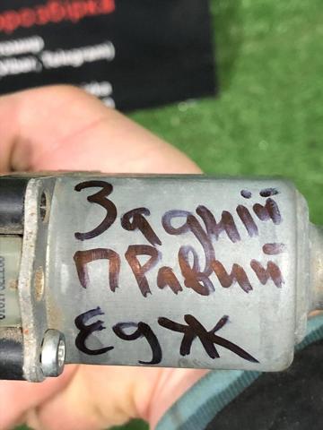 Двигун стеклопод'емника двері задньої, правої FT4Z5823394A FORD