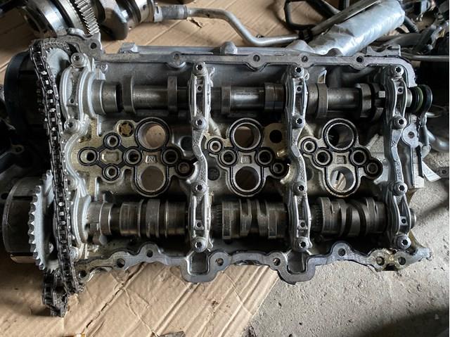 Розподільний вал двигуна випускний лівий 06M109102EM VAG