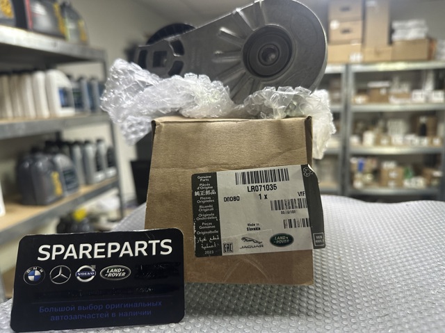 Натягувач приводного ременя LR071035 LAND ROVER