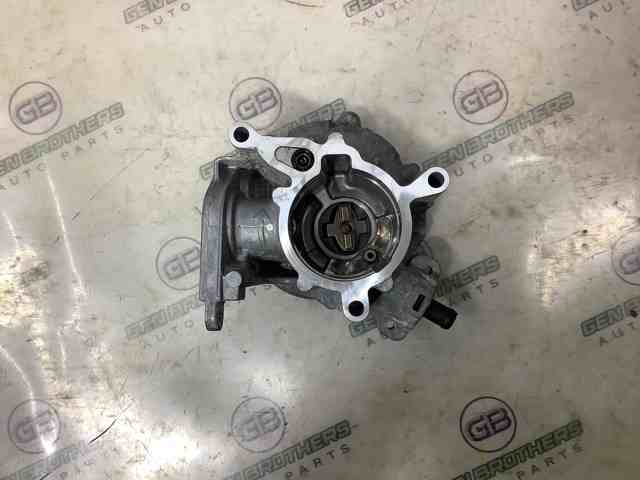 Насос вакуумний 06J145100G VAG
