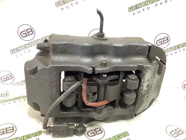 Супорт гальмівний задній правий 7P6615424D VAG