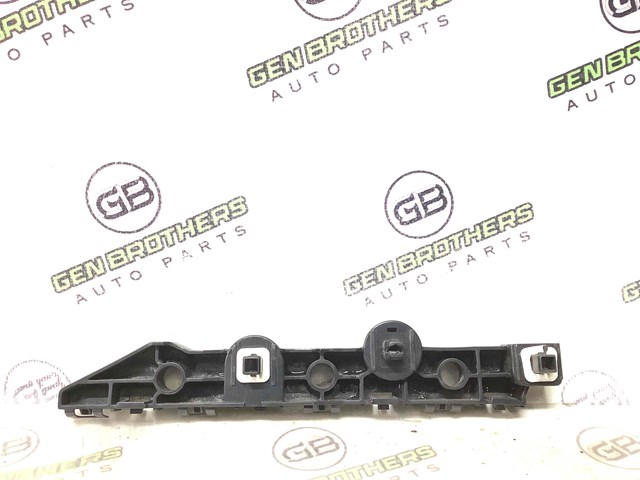 Ліве кріплення заднього бампера 852214GA0A NISSAN