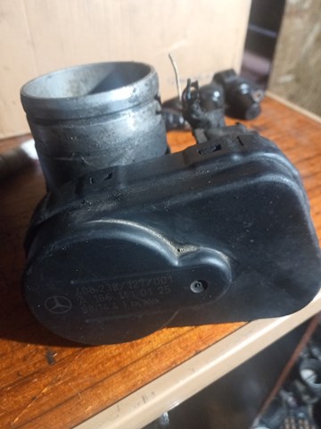 Дросільна заслінка в зборі A1661410125 MERCEDES