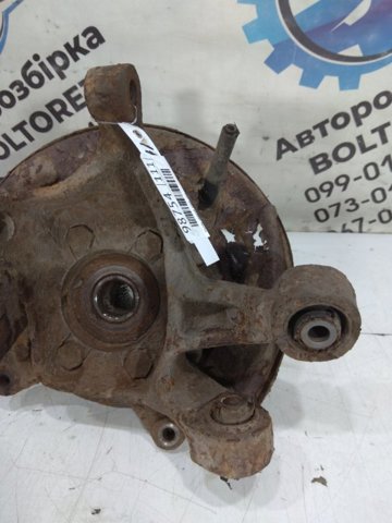 Цапфа - поворотний кулак задній, лівий 28411SC011 SUBARU