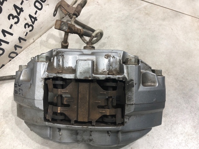 Супорт гальмівний, передній, правий 41001JL00A NISSAN