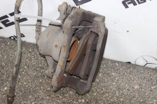 Супорт гальмівний, передній, правий 45018SWWG00 HONDA