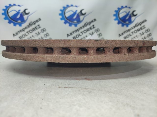 Диск переднього гальма 4G0615301 VAG
