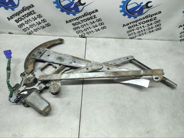 Мотор склопідйомника дверей передніх, правих 62113FC000 SUBARU