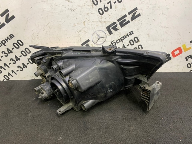 Фара ліва передня Mitsubishi L 200 4