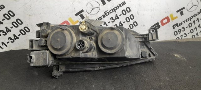 Фара ліва передня 90512711 OPEL