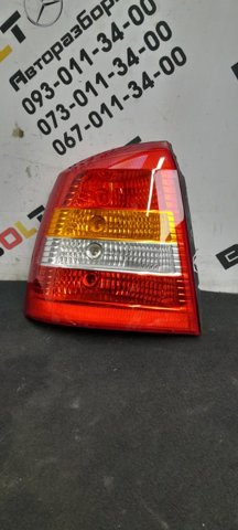 Задня ліва фара 90521542 OPEL