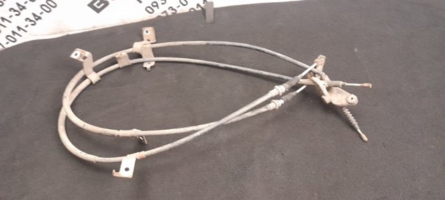 Трос стоянкового гальма задній лівий EG2144420F MAZDA