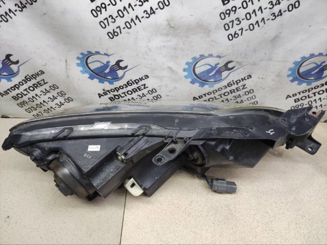 Фара ліва передня EG21510L0K MAZDA