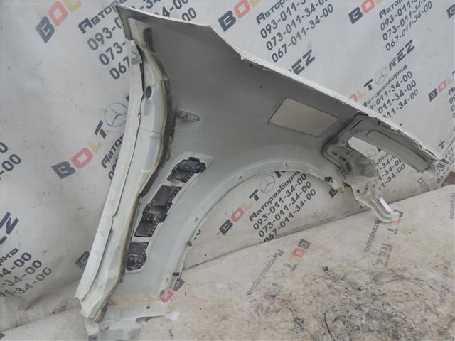 Переднє ліве крило F31011CAAA NISSAN