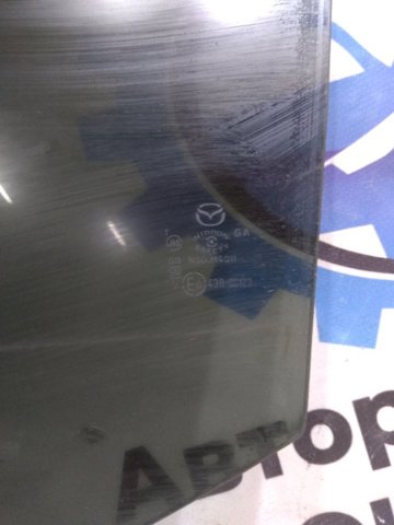Скло заднє ліве GHK173510C MAZDA