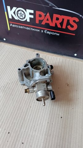 Насос вакуумний 06K145100BB VAG