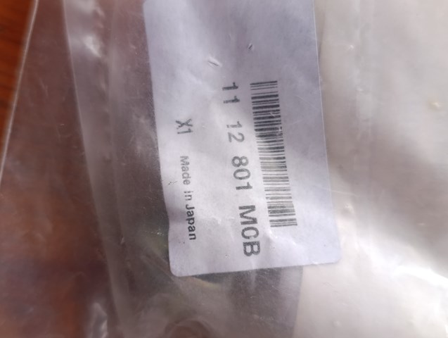 Болт піддона 1112801M0B NISSAN