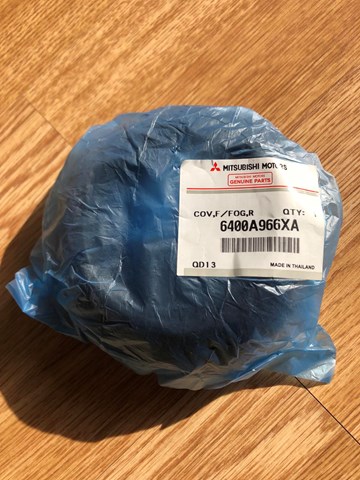 Оправа протитуманки 6400A966XA MITSUBISHI