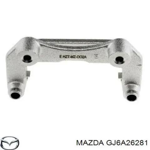 Скоба гальмівного заднього супорта GJ6A26281 MAZDA