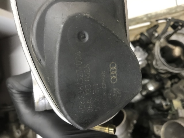 Заслінка повітряна 06A133062S VAG