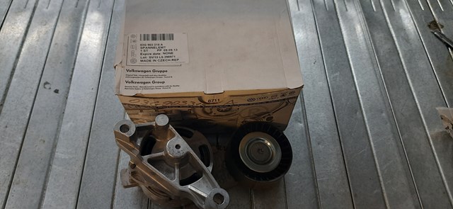 Натягувач приводного ременя 03G903315A VAG