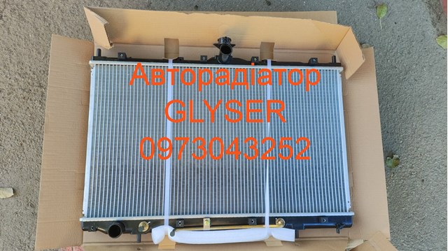 Наявність. ціна опт в грн. радиатор охлаждения дви 1350A325