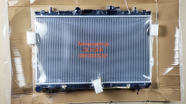 Радіатор охолодження hyundai coupe (gk) (02-) 2.0 i 16v (вир-во nissens) 253102D010