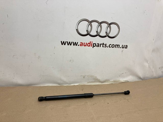 Амортизатор під капот 80A823359A VAG