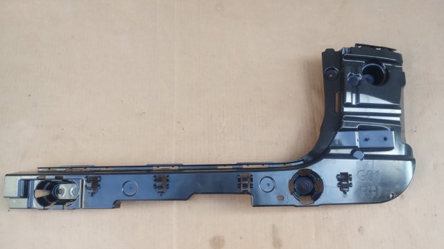 Кронштейн бампера заднього, правий 51127400666 BMW