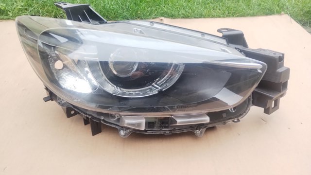 Фара передня права KA1F51030C MAZDA