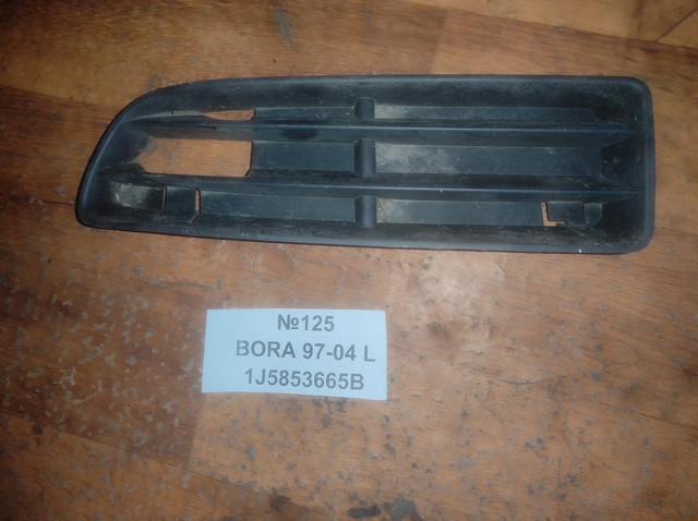 Решітка переднього бампера, ліва 1J5853665B VAG