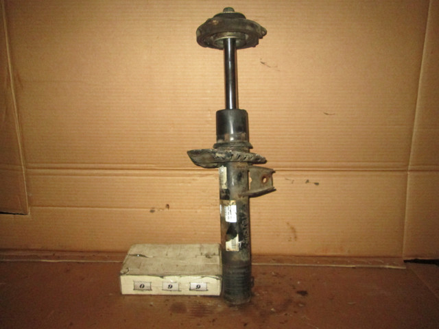 Стойка амортизатора передняя 1T0413031GP VAG