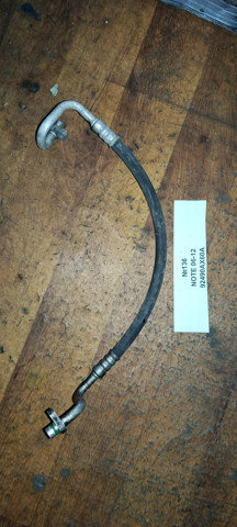 Трубка кондиціонера від компресора до радіатора 92490AX60A NISSAN