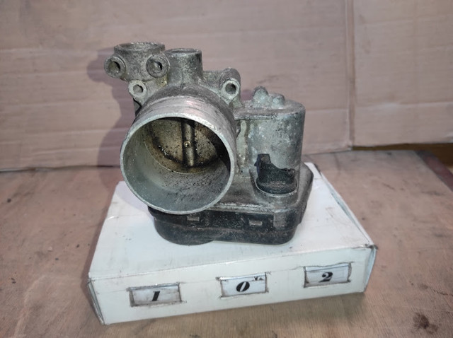 Дросільна заслінка в зборі A1661410125 MERCEDES