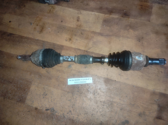 Піввісь передня ліва GG3125600D MAZDA