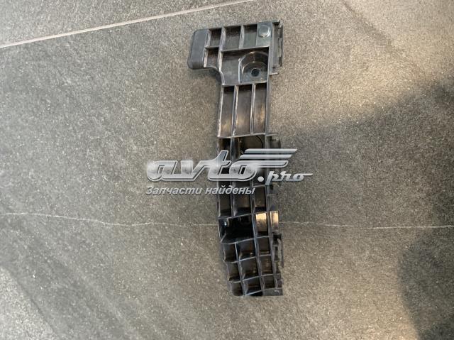 Ліве кріплення заднього бампера 521560E021 TOYOTA