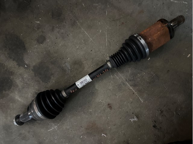 Піввісь передня ліва 31607622913 BMW
