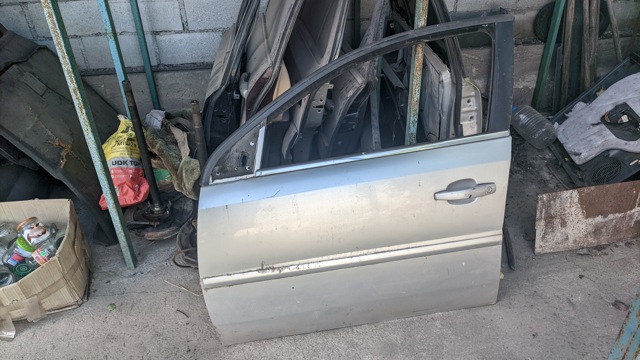 Дверь передня ліва 124083 OPEL