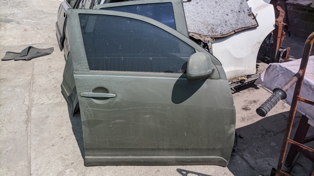 Дверка передня права 5700A276 MITSUBISHI