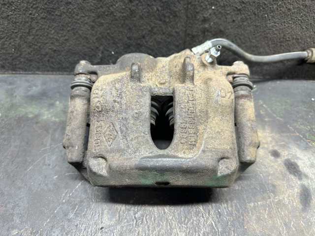 Супорт гальмівний, передній, лівий 7701050919 RENAULT