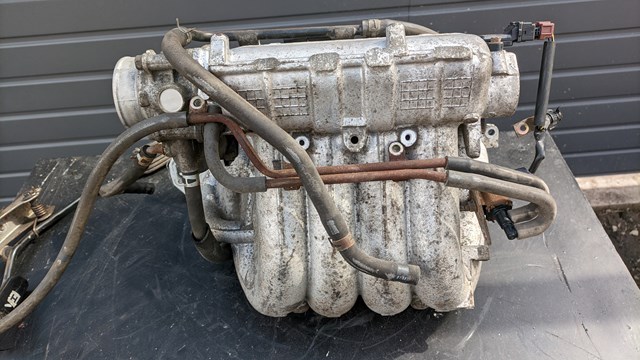 Колектор впускний MN143750 MITSUBISHI