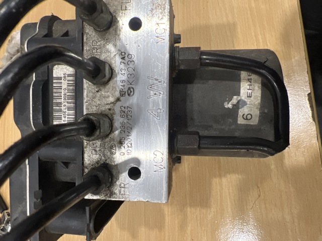 Блок управління АБС (ABS) EH46437A0 MAZDA