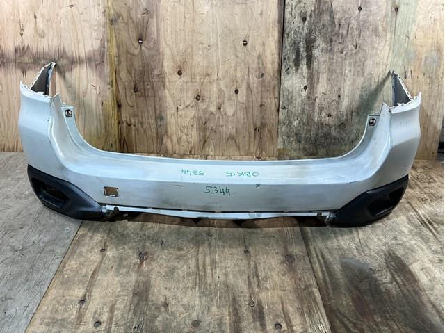 Кожух бампера заднього 57704AL130 SUBARU