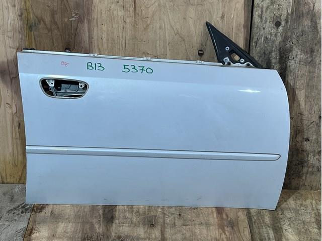 Пасажирські передні двері 60009AG0219P SUBARU