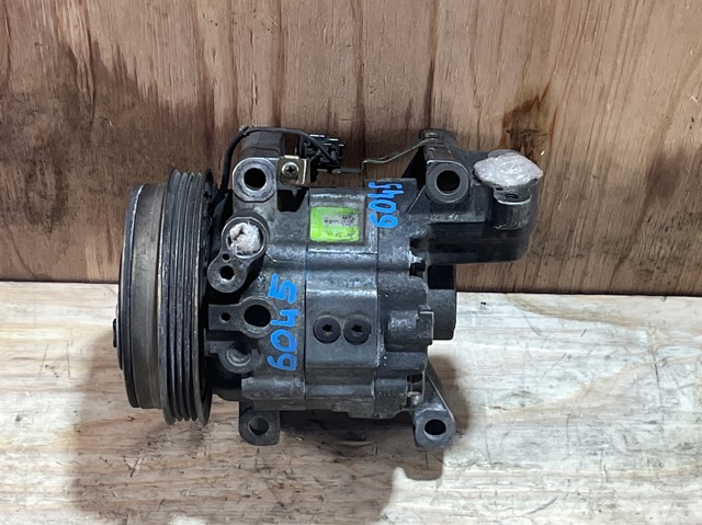 Компресор кондиціонера 73110FA150 SUBARU