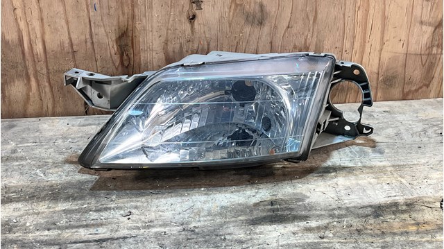 Фара ліва CB08510L0D MAZDA