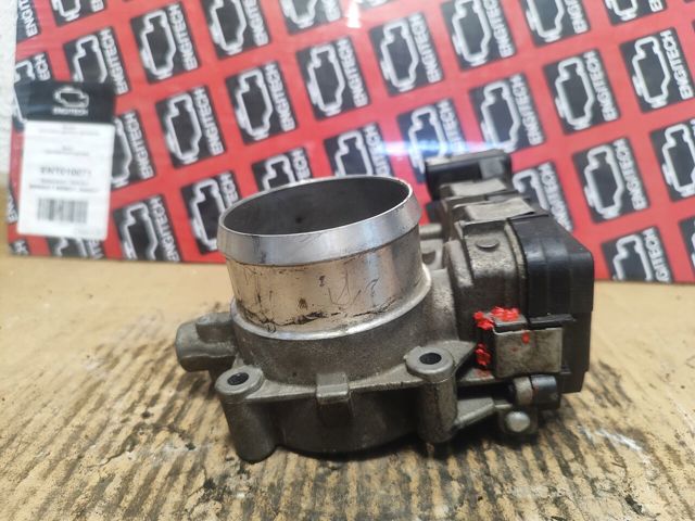 Дросільна заслінка в зборі 03C133062AA VAG